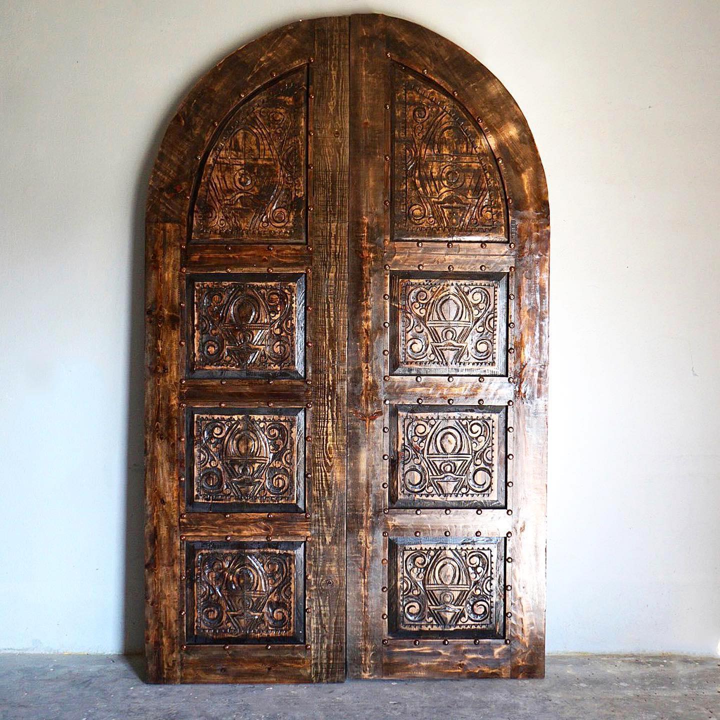 Hiram Carved Arch Door
