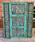 Dolores carved door