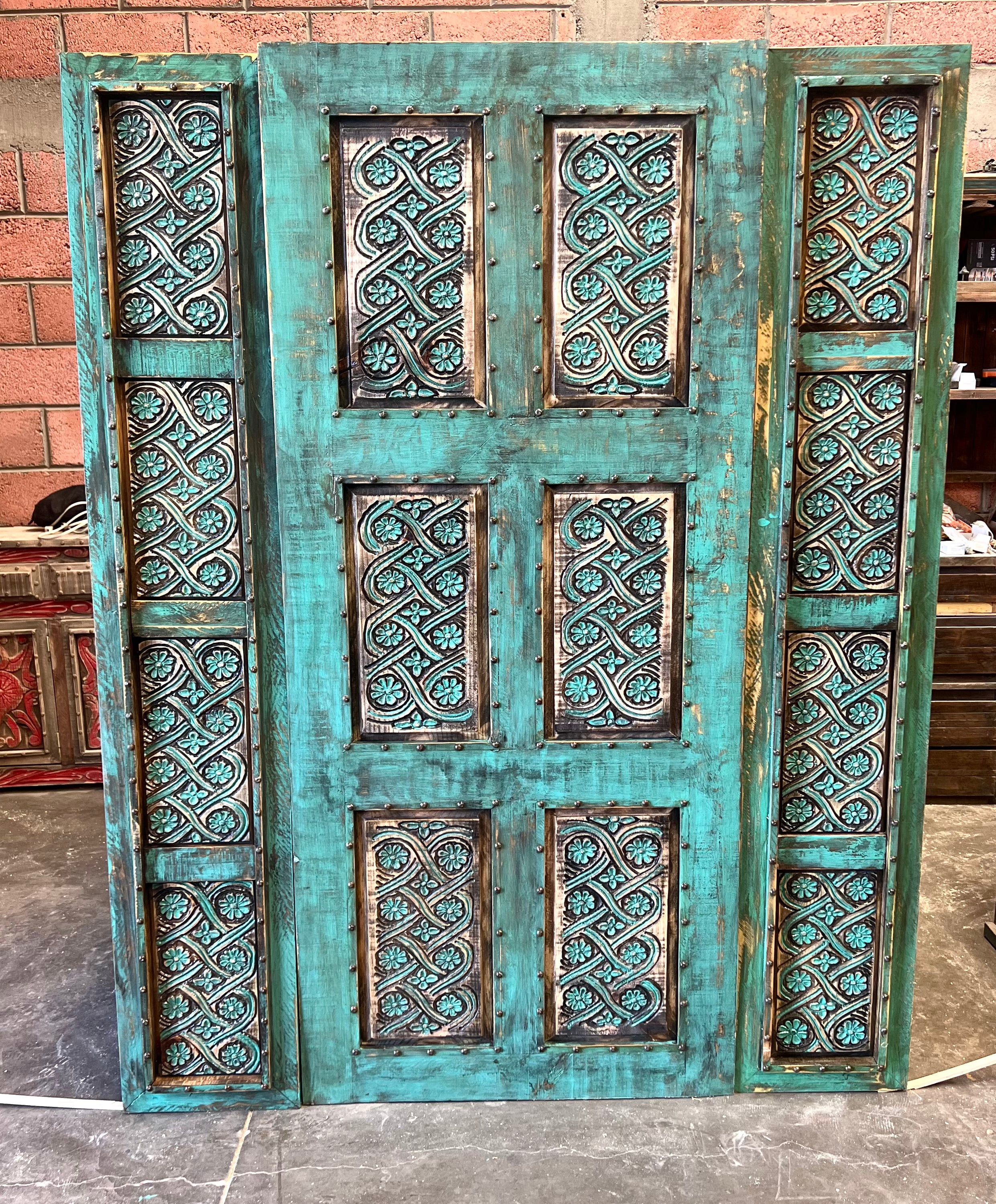 Dolores carved door